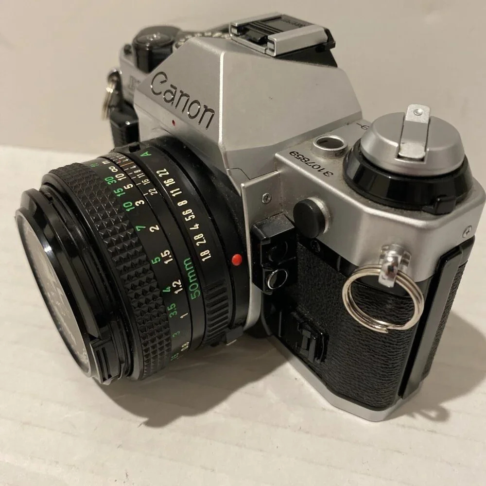 Canon Silver and Black Film Camera Kit with Lenses and Flash